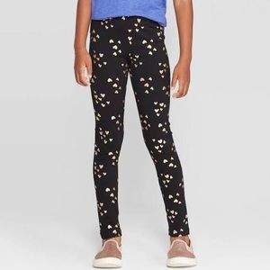 Black leggings with golden hearts